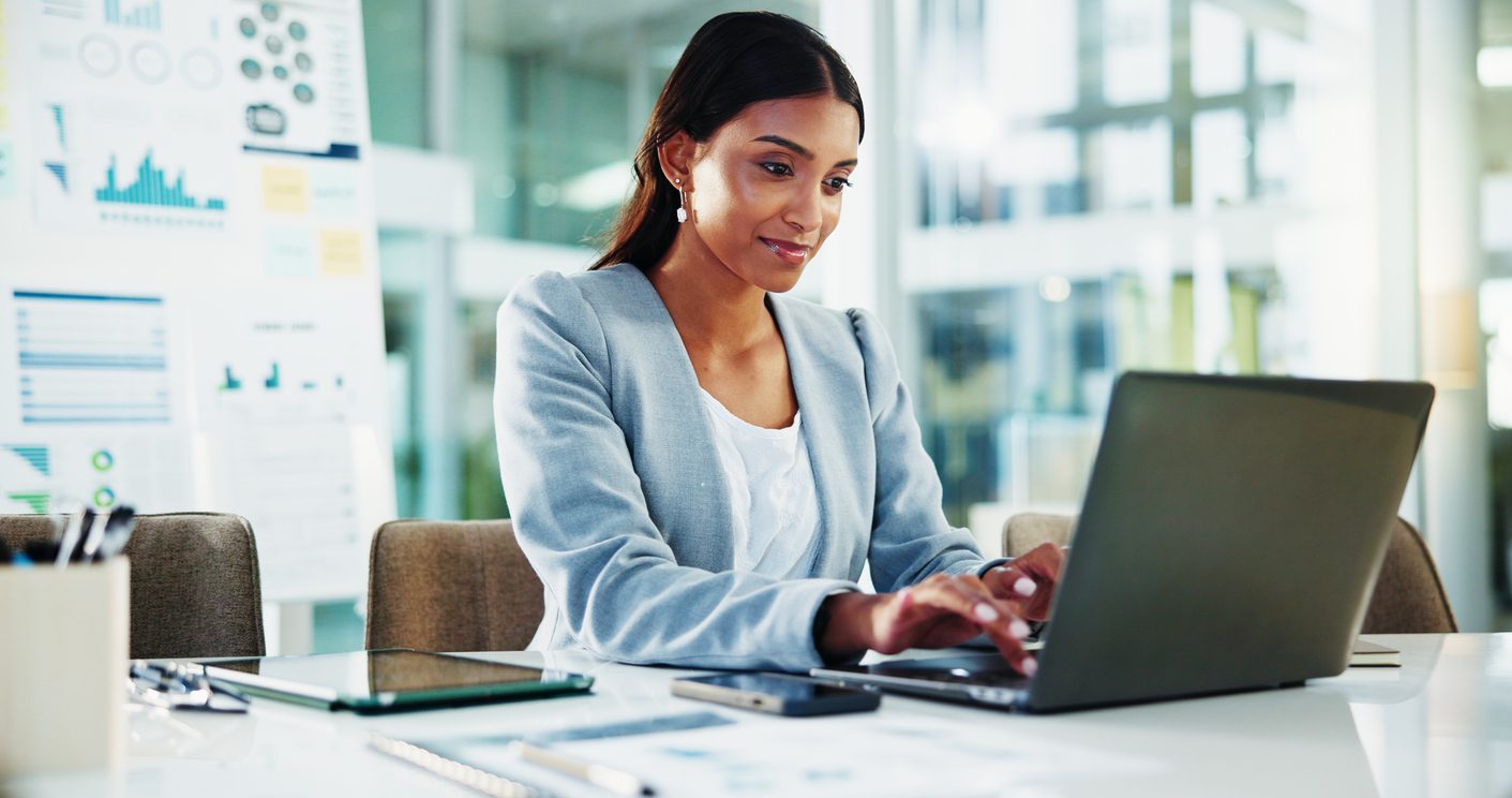 finance-businesswoman-and-typing-on-laptop-at-desk-for-tax-compliance-report-risk-management-and-auditing-review-reading-accountant-and-technology-for-financial-proposal-and-investment-project