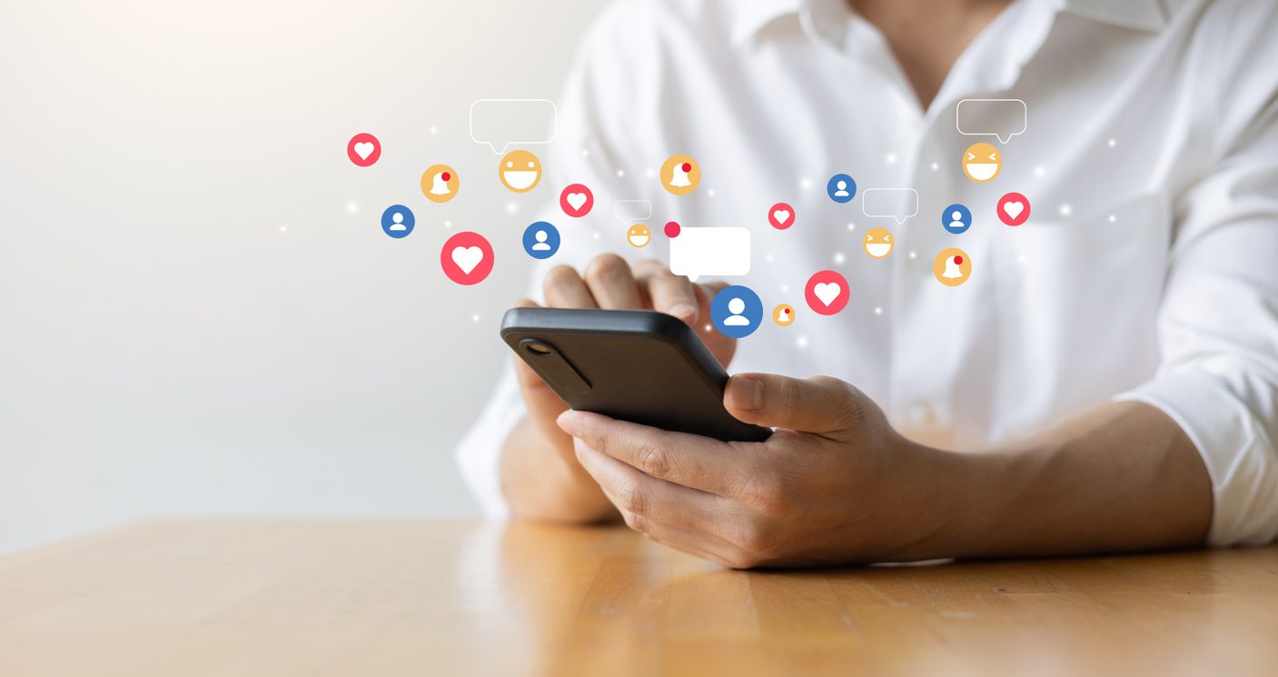 close-up-man-hand-hold-smartphone-and-use-social-media-network-application-to-connect-or-interact-with-people-and-friend-on-online-platform-with-virtual-icon-symbol-for-modern-lifestyle-and-communicat
