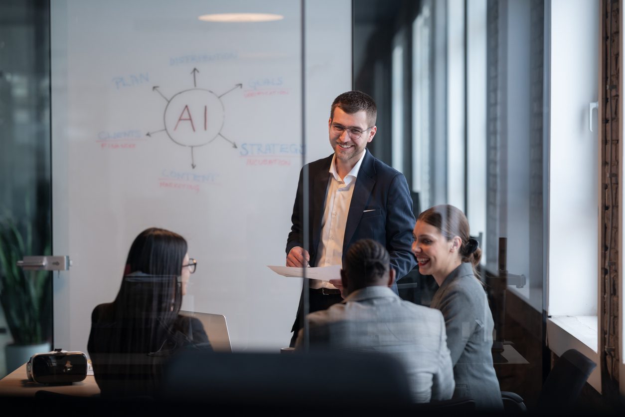 diverse-business-team-in-a-modern-office-during-a-meeting-discussing-artificial-intelligence-strategy-concept-of-ai-innovation-teamwork-leadership-corporate-planning-professional-collaboration-2